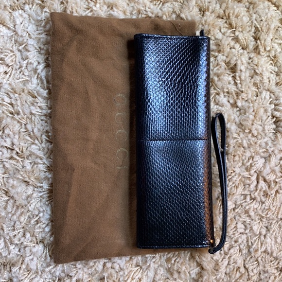 Gucci trifold lizard clutch. In black w/silver hardware/inside gg zip pocket. - Picture 2 of 6